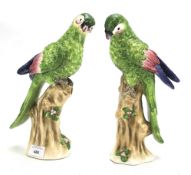 A pair of Jeanne Reeds ceramic parakeets.