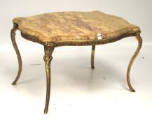 A 20th century marble top coffee table.