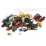 An assortment of diecast commercial and industrial vehicles.