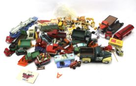 An assortment of diecast commercial and industrial vehicles.