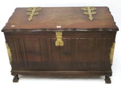 An African hardwood brass bound chest.