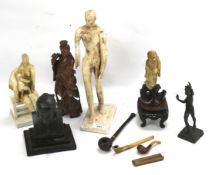 An assortment of figures and pipes.