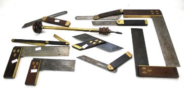 A collection of vintage carpenter's set squares. Including examples by Atkin & Sons, R.