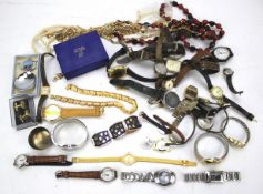 An assortment of costume jewellery and wristwatches.