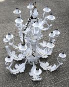 A 20th century large cast metal white painted chandelier.