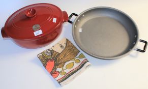 A new Emilie Henry France oval casserole dish and cover and a paella pan.