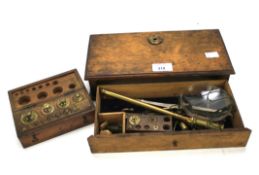A Victorian set of weighing scales and a set of various weights.