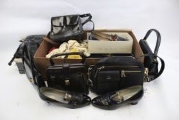 An assortment of ladies handbags and shoes.