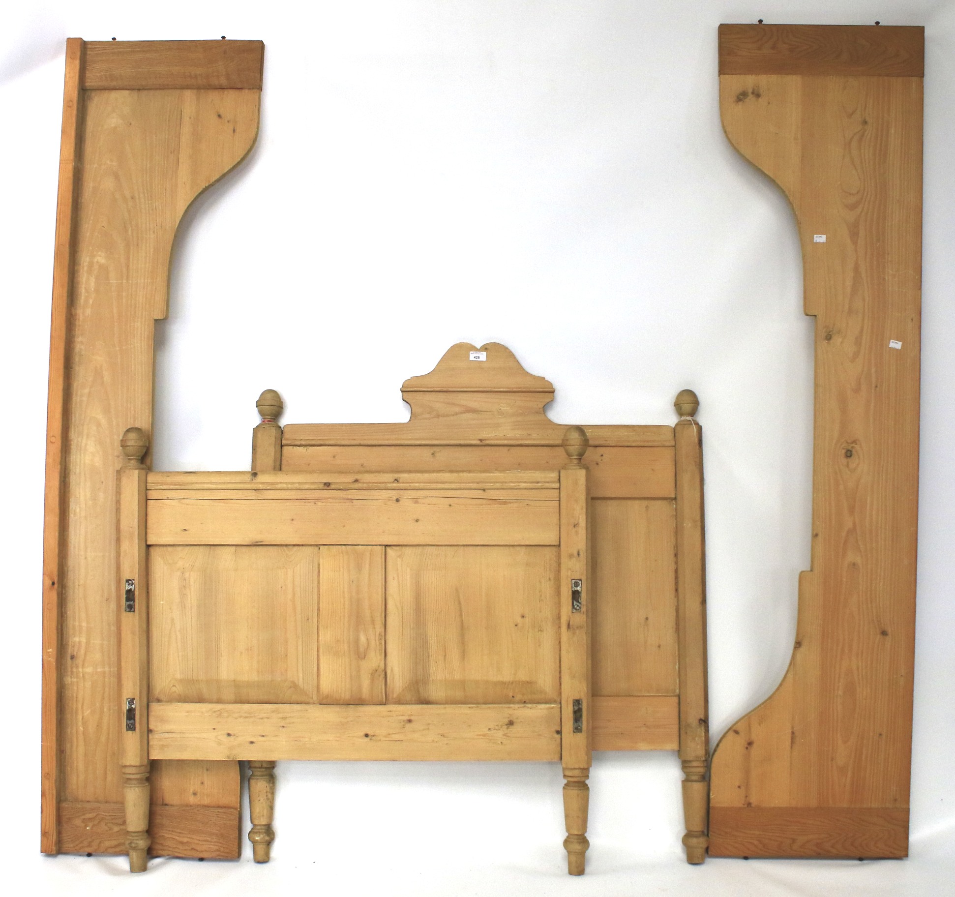 A pine single bed frame.