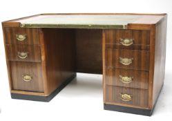 A retro style mahogany kneehole desk.