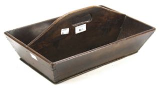 A 19th century mahogany cutlery tray. Two divisions with a single handle. L37.