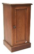 An Edwardian inlaid mahogany bedside cabinet.