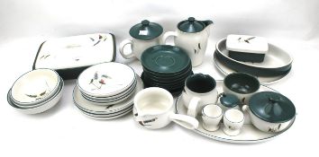 A collection of Denby 'Greenwheat' pattern tea and dinner wares.