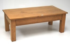A contemporary burr oak coffee table.