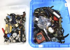 A large assortment of watches and clock parts.