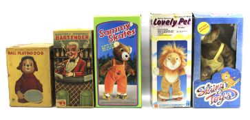 Five battery powered vintage toys.