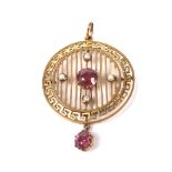 An Edwardian gold, pink tourmaline and seed-pearl pendant.