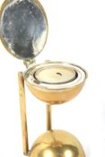 An early 20th century brass candle holder.