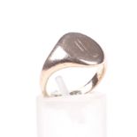 A mid-20th century 9ct rose gold oval signet ring.