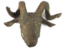 A 20th century cast iron model of a ram's head.