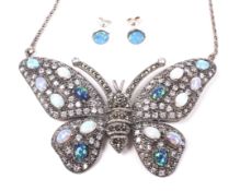 A multi-gem 'butterfly' necklace.