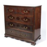 A 19th century mahogany blind fretwork decorated chest of drawers.