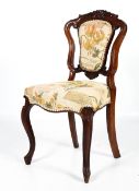 A Victorian rosewood upholstered hall chair.