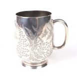 A Victorian silver engraved baluster tankard.