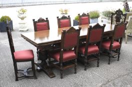 An oak refectory dining table and eight chairs.