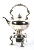 A Late Victorian silver-plated spirit kettle on stand.