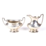 An American Sterling silver milk jug and sugar bowl by Bailey, Banks & Biddle .