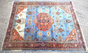 A 20th century Tabriz Persian carpet.