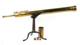 A large 19th century brass telescope on stand.