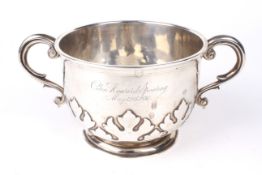 A silver two-handled cup.
