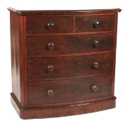 A Victorian mahogany bow fronted chest of drawers.