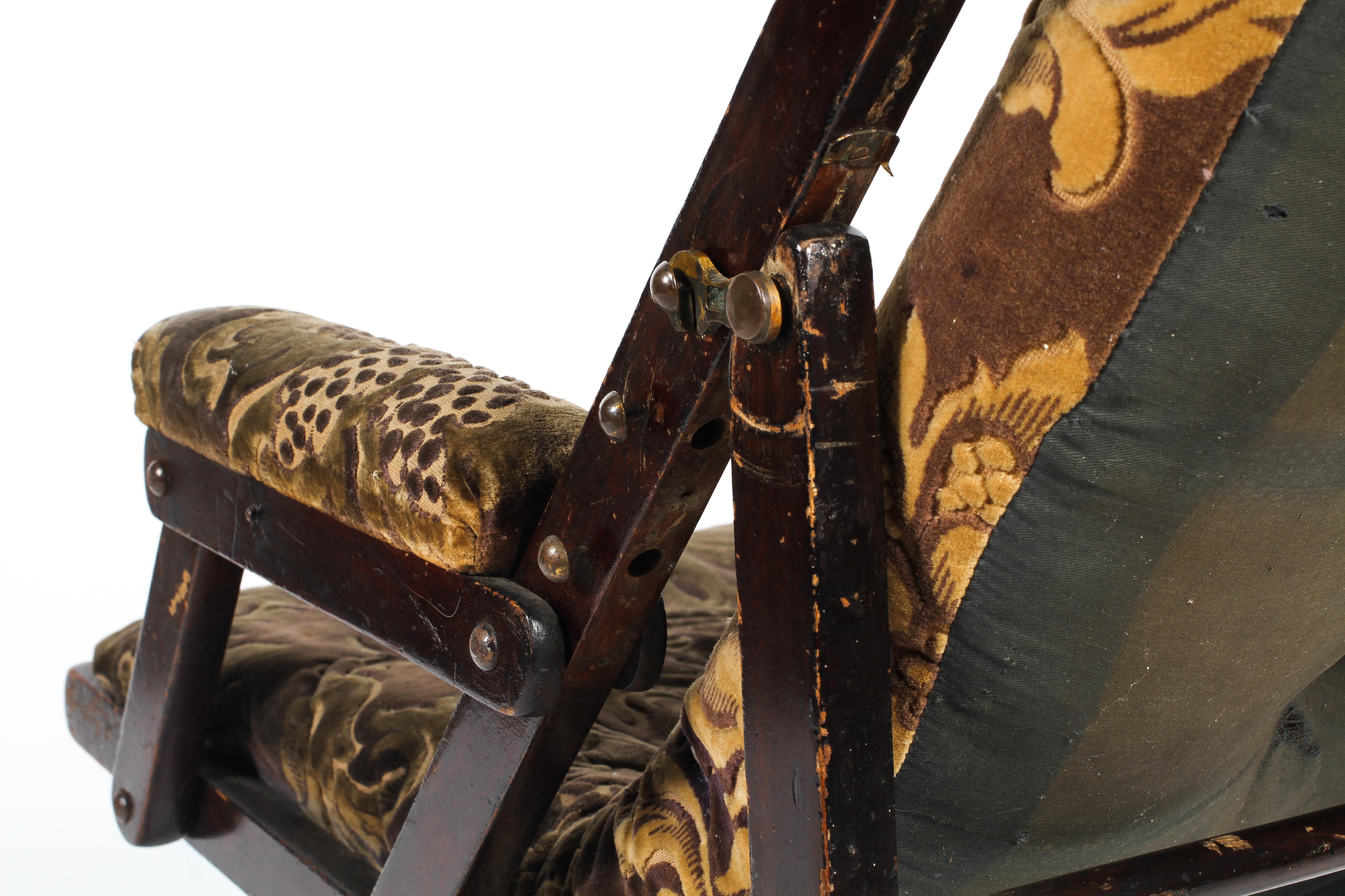 A Victorian folding upholstered steamer-type chair. - Image 3 of 3