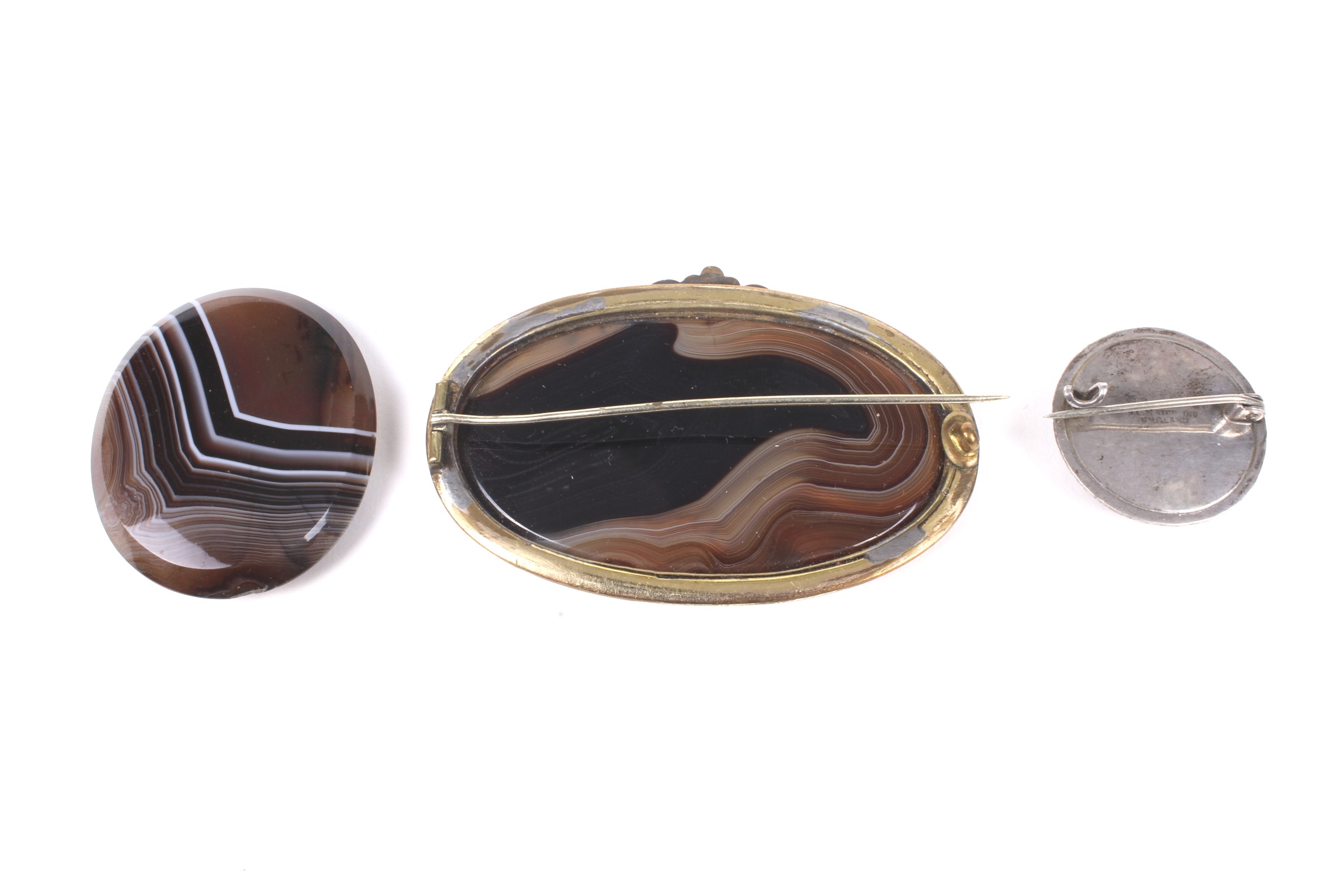 Two hardstone brooches and an oval agate panel. - Image 2 of 2