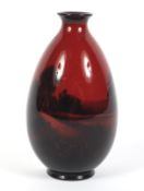 A Royal Doulton flambe tapering oviform vase.