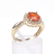 A 9ct gold, fire opal and cubic zirconia cluster ring.