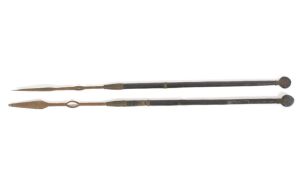 Two early 20th century African iron and wooden shafted spears.