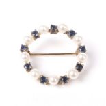 A modern 9ct gold, sapphire and cultured-pearl circlet brooch.