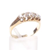 An early 20th century gold and diamond five stone ring.