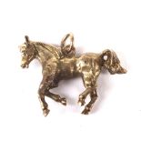 9ct charm in the form of a trotting horse