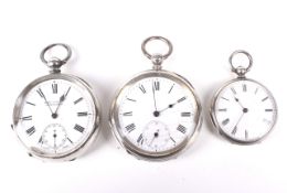 Two open faced silver pocket watches and a smaller fob watch.