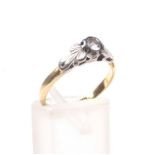 A mid 20th century gold and diamond solitaire ring,