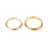 Two 22ct gold wedding bands. Comprising; a court shaped band with hallmarks for Birmingham 1924,