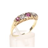 A vintage ruby and diamond five stone carved half-hoop ring,