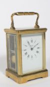 A French brass carriage clock.
