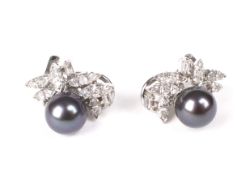 A pair of South-sea black cultured pearl and diamond earrings.