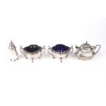 A composite silver four piece condiment set.